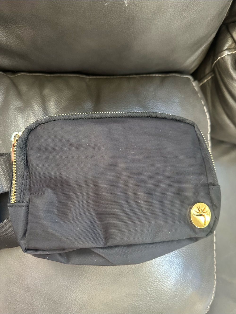 Black Women's Belt Bag with Gold Medallion Accent